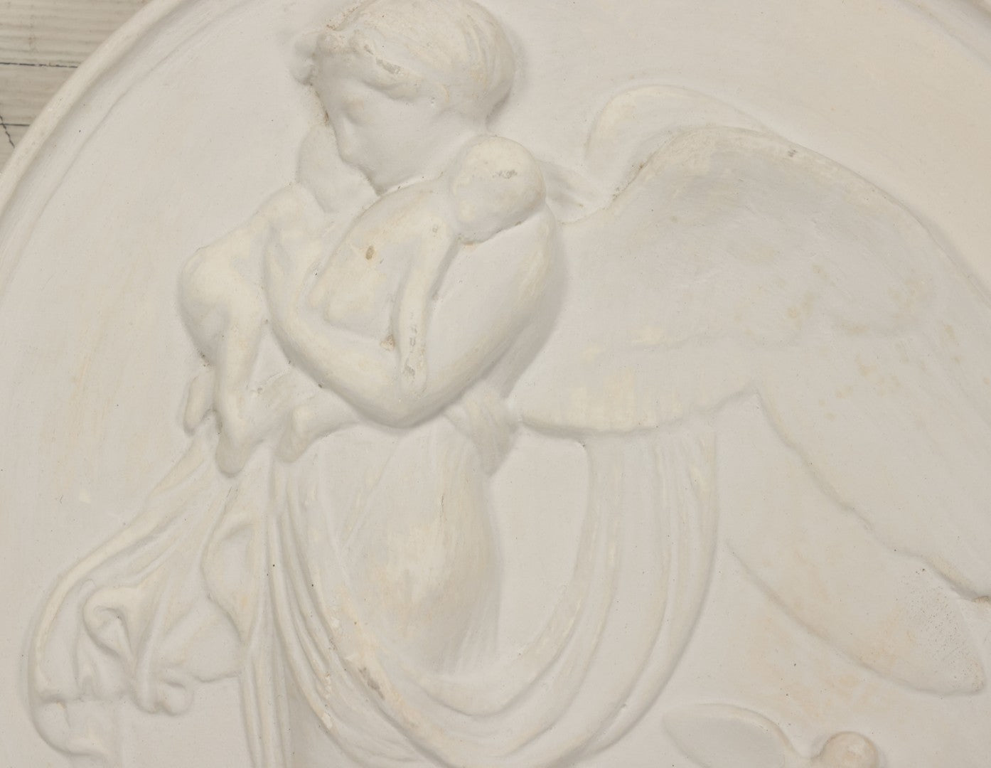 Lot 099 - Vintage White Plaster Relief Plaque, Winged Angel Holding Child, With Owl, 13-3/8" Diameter