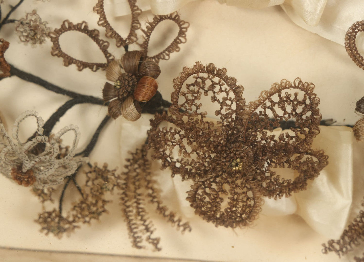 Lot 005 - Antique Victorian Human Hair Work Wreath In Rectangular Shadow Box With White Bow, Center Hair Flower Bouquet, 23-3/4" x 20-3/8" x 3-1/2"