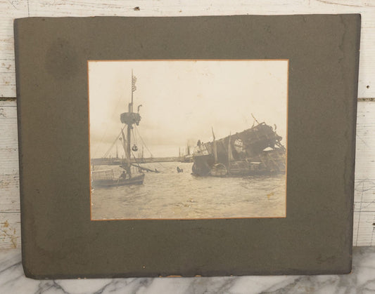 Lot 022 - Antique Boarded Photograph Of The Aftermath Of The Sinking Of The U.S.S. Maine, Havana Harbor, Cuba, 1898, Event That Sparked The Spanish-American War, 17" x 13-1/4"