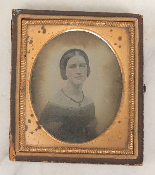 Lot 029 - Antique 1/6th Plate Ambrotype Photograph Of A Young Woman Identified Only As "Beautiful" With Handwritten Note On Verso, In Half Leatherette Union Case, With Faint Tinting