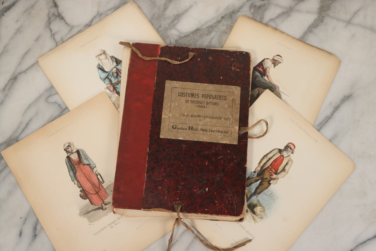 Lot 087 - Antique French Folio Book Of "Costumes Populaires De Diverses Nations (1863), Gaston Hue, Paris, Featuring 20 Hand Colored Lithographs Of The Dress And Costumes Of Various Culture, Mostly In Turkey, Egypt, And Greece, Etc.