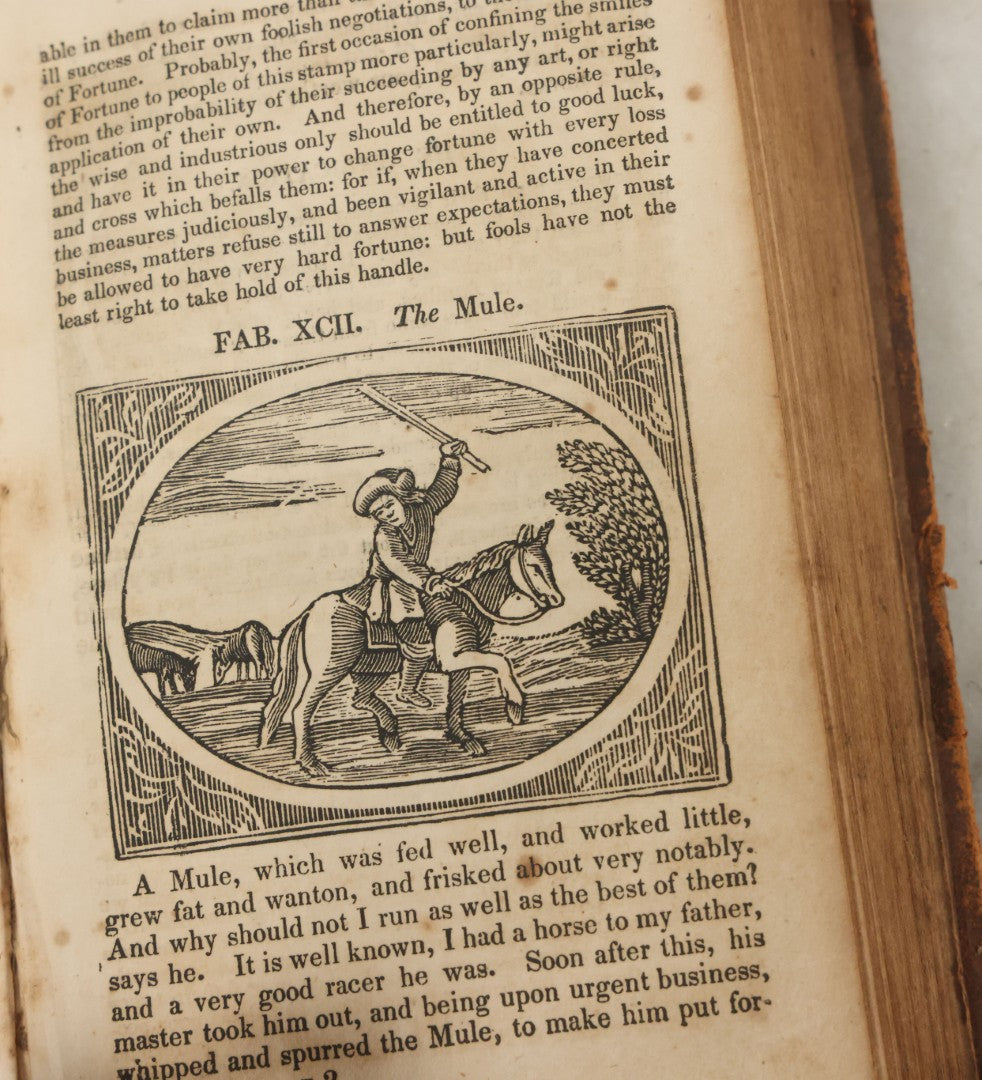 Lot 138 - "Aesop's Fables" Early 19th Century Fable Book Featuring Woodcut Engravings, Note Opening Pages Missing, Foxing Throughout