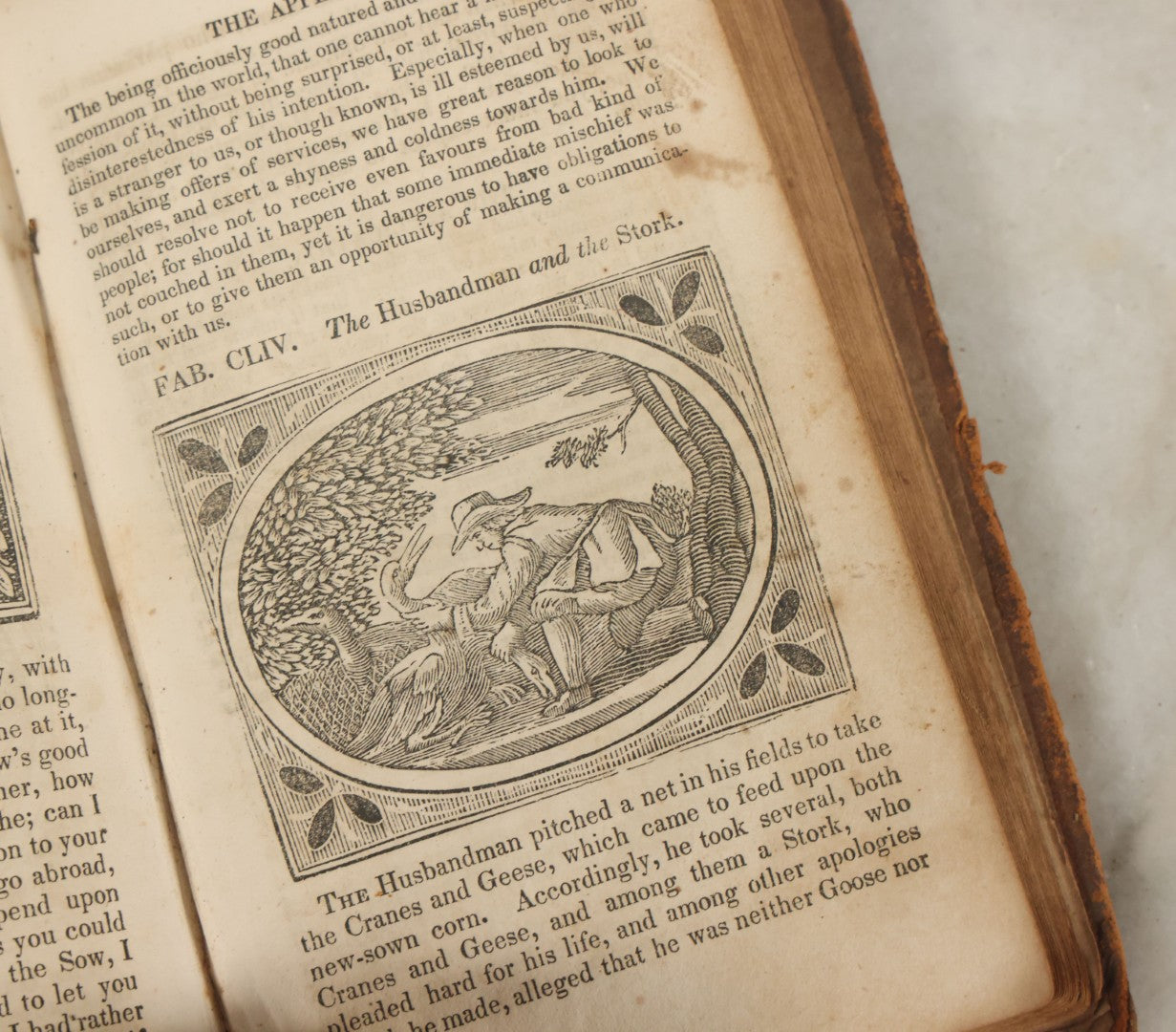 Lot 138 - "Aesop's Fables" Early 19th Century Fable Book Featuring Woodcut Engravings, Note Opening Pages Missing, Foxing Throughout