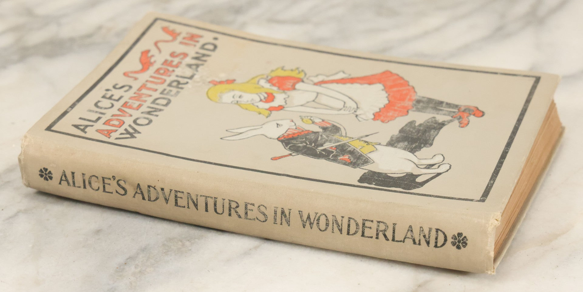 Lot 139 - "Alice's Adventures In Wonderland" Vintage Book By Lewis Carroll With 40 Illustrations By John Tenniel, W.B. Conkey, Publishers, Chicago, Early 20th Century, With Illustrated Cover, Note Slight Warping To Covers
