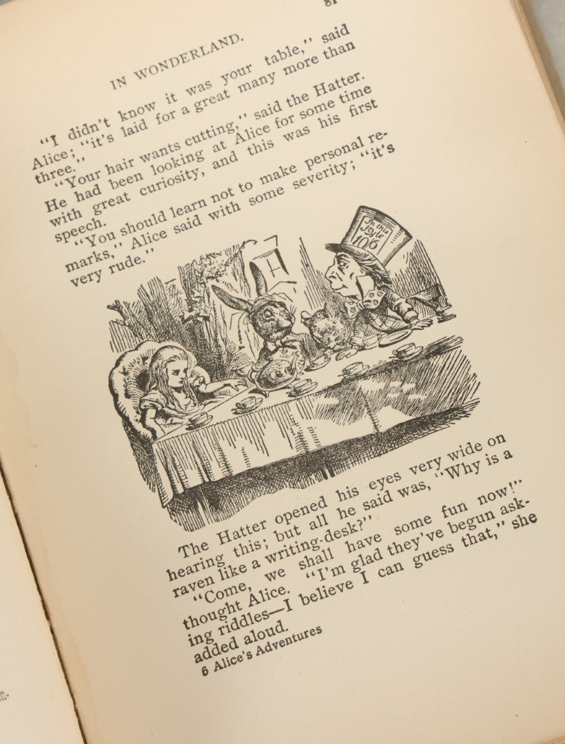 Lot 139 - "Alice's Adventures In Wonderland" Vintage Book By Lewis Carroll With 40 Illustrations By John Tenniel, W.B. Conkey, Publishers, Chicago, Early 20th Century, With Illustrated Cover, Note Slight Warping To Covers