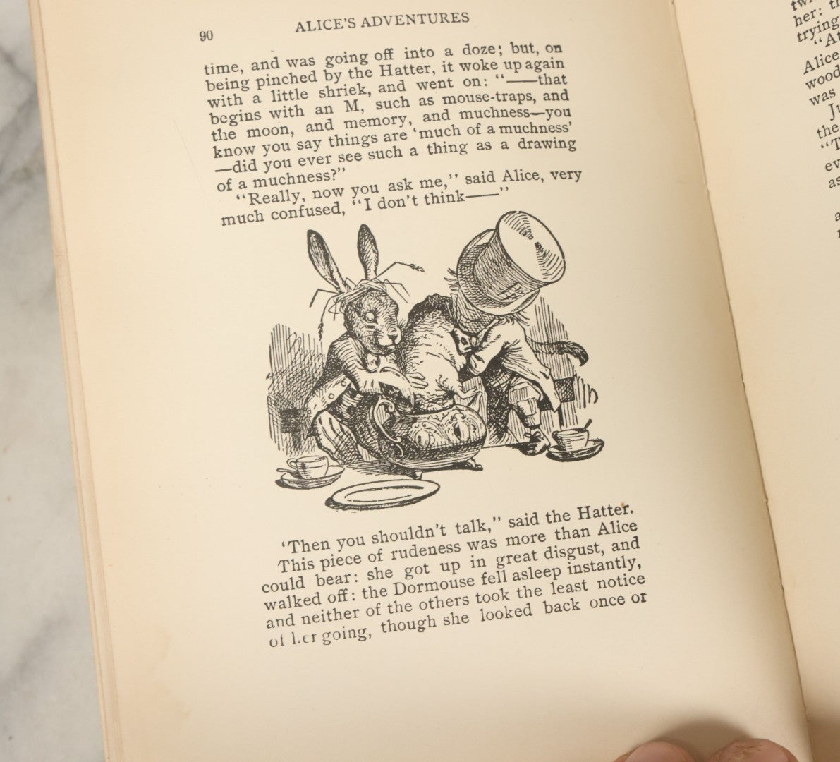 Lot 139 - "Alice's Adventures In Wonderland" Vintage Book By Lewis Carroll With 40 Illustrations By John Tenniel, W.B. Conkey, Publishers, Chicago, Early 20th Century, With Illustrated Cover, Note Slight Warping To Covers