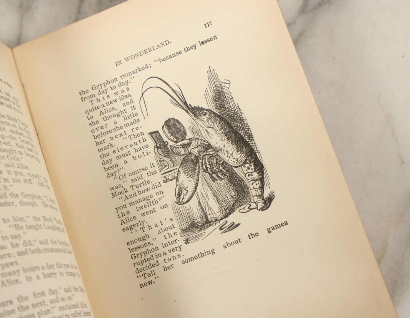 Lot 139 - "Alice's Adventures In Wonderland" Vintage Book By Lewis Carroll With 40 Illustrations By John Tenniel, W.B. Conkey, Publishers, Chicago, Early 20th Century, With Illustrated Cover, Note Slight Warping To Covers