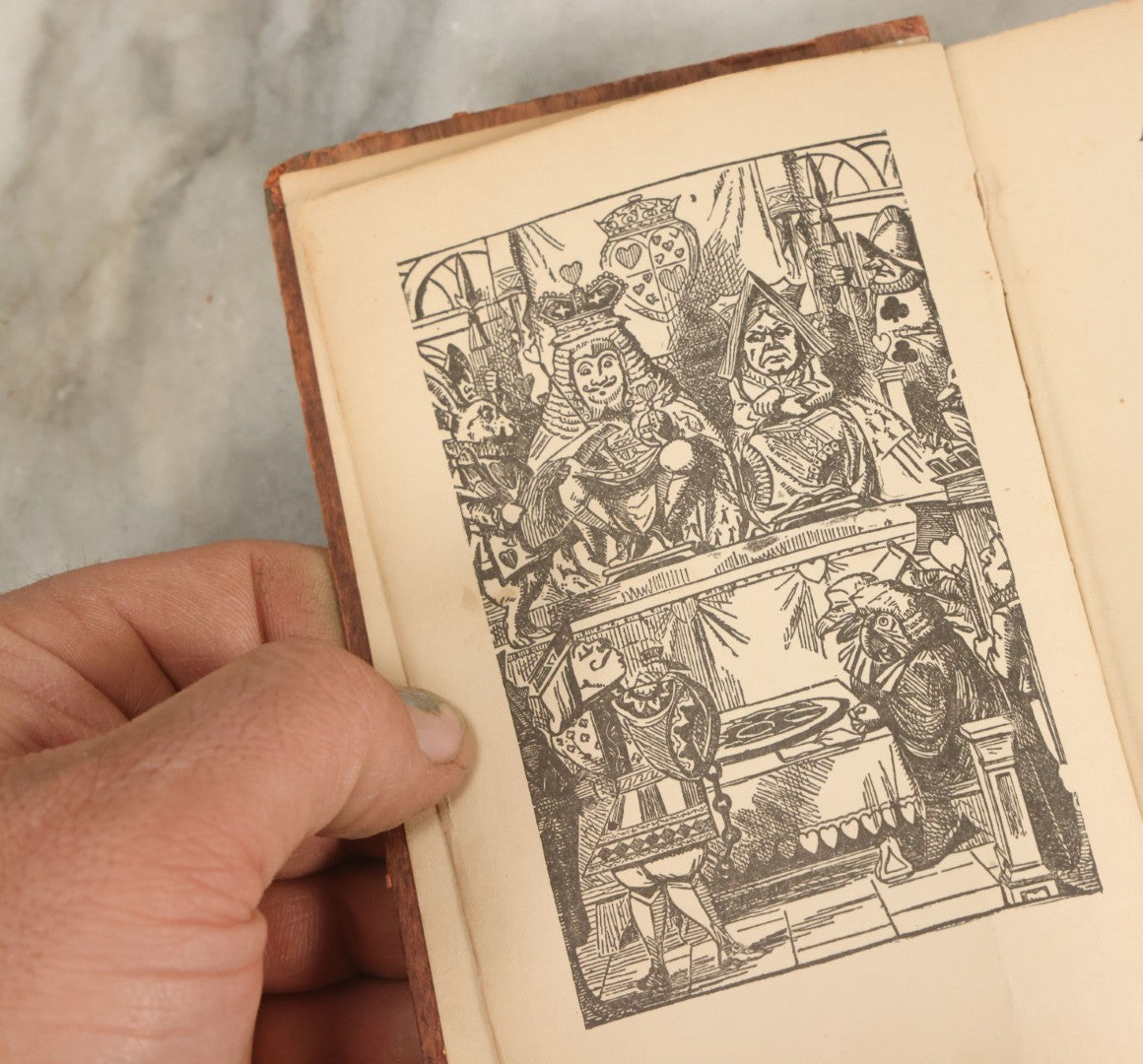 Lot 140 - "Alice's Adventures In Wonderland" Antique Book By Lewis Carroll With Burnt Red Art Nouveau Cover Design And Illustrations Throughout, Note Binding Wear, Circa Late 19th Century