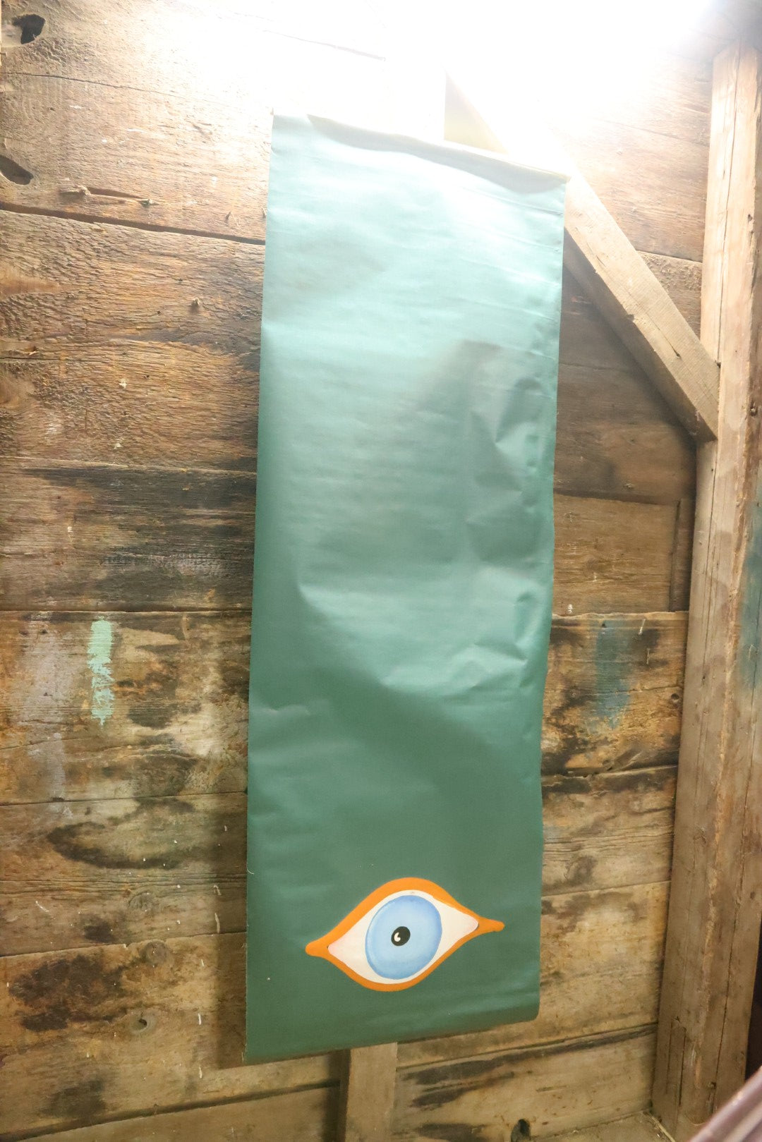 Lot 080 - Vintage Hand Painted Eyeball Art On Green Vinyl Window Blind,  26" Across x 73" Long Unrolled Including Hangers