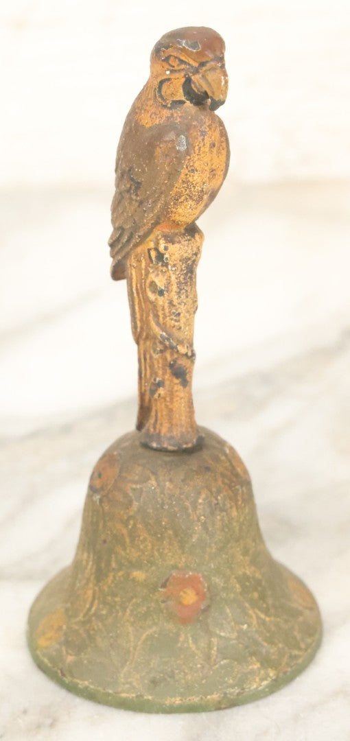 Lot 086 - Antique Cold Painted Tropical Style Brass Dinner Bell With Parrot Handle, Note Handle Somewhat Loose, Still Useable