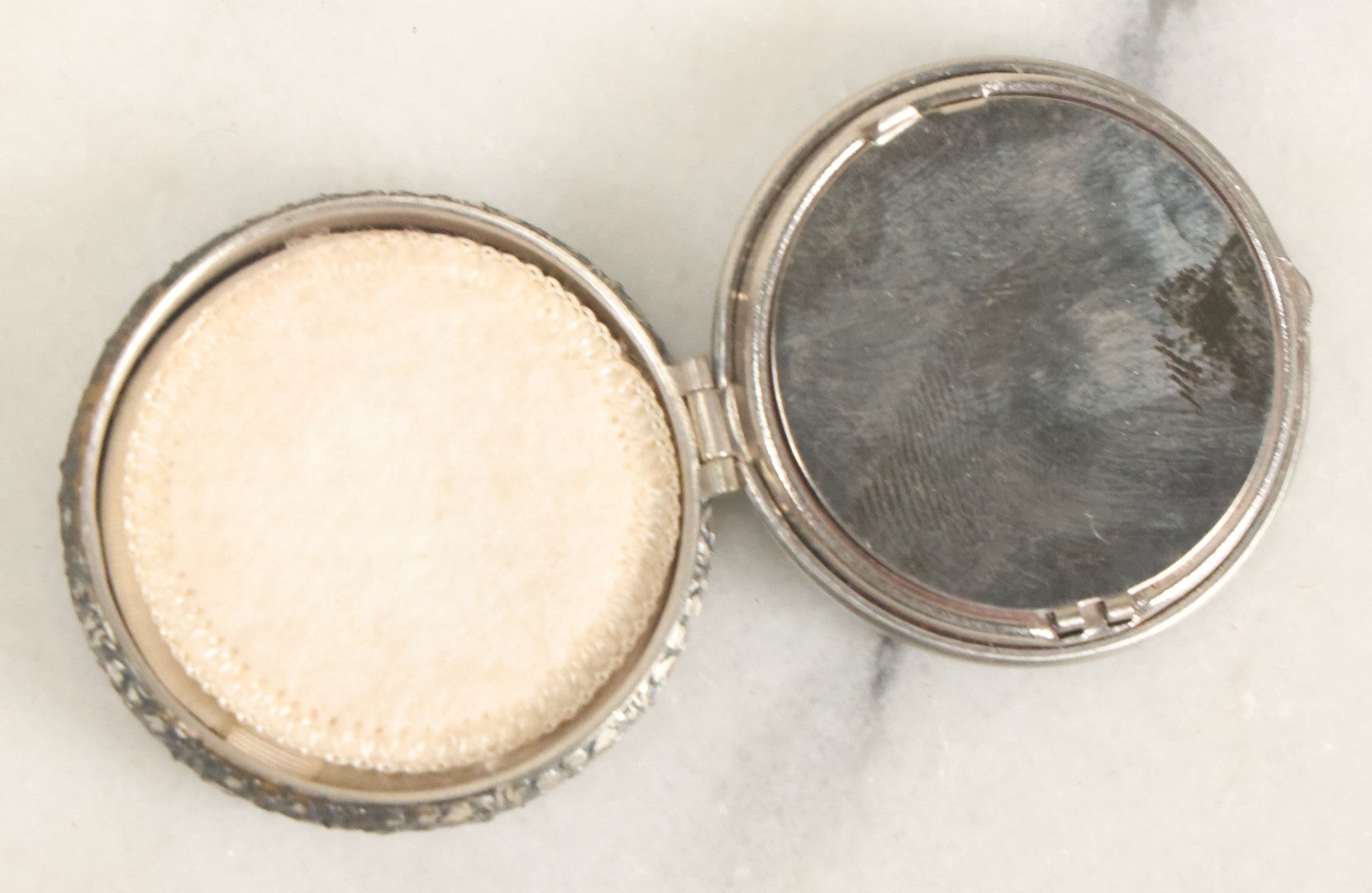 Lot 090 - Vintage Silverplate Compact With Floral Motif Edge And M.P. Monogram On Verso