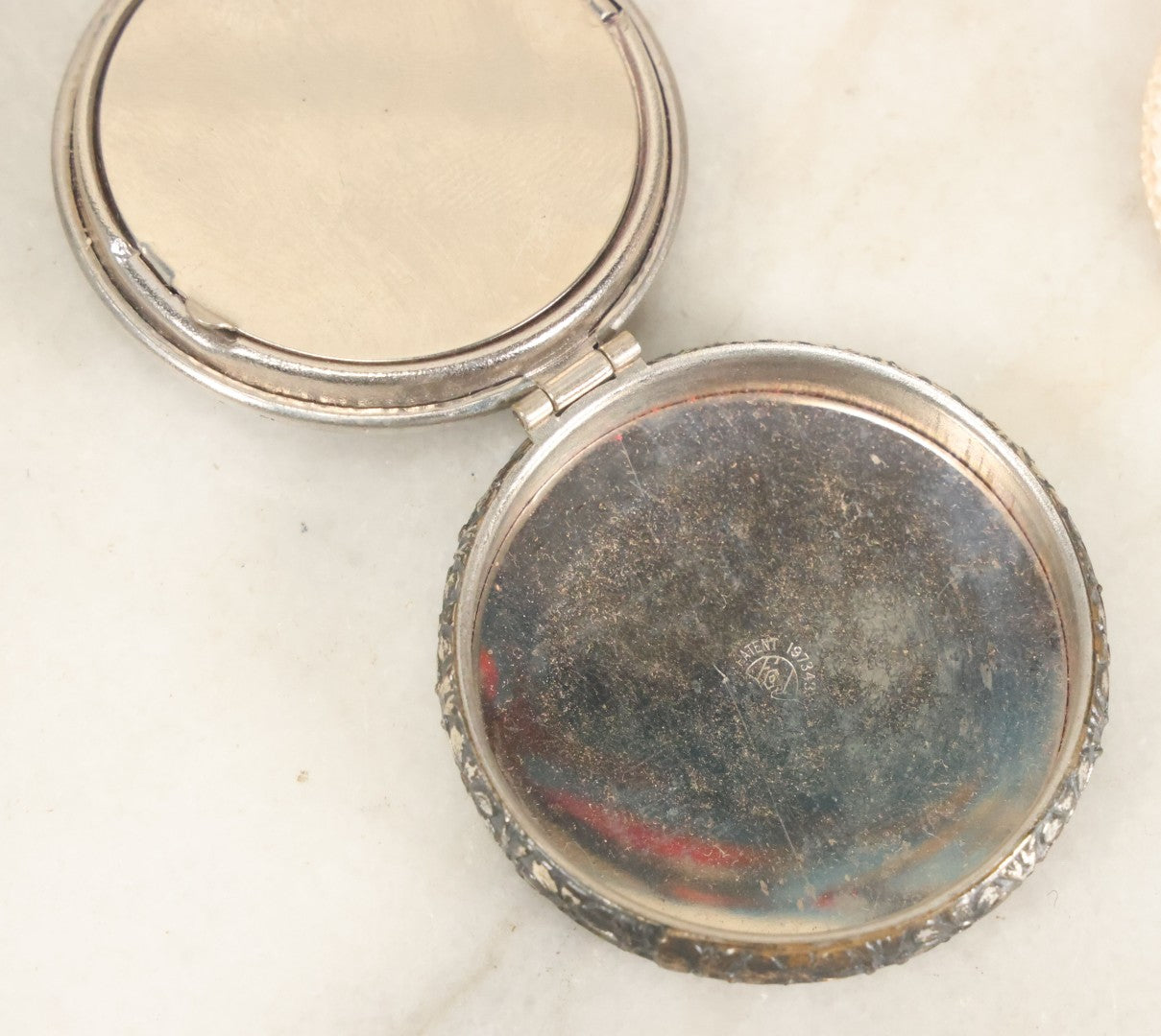 Lot 090 - Vintage Silverplate Compact With Floral Motif Edge And M.P. Monogram On Verso
