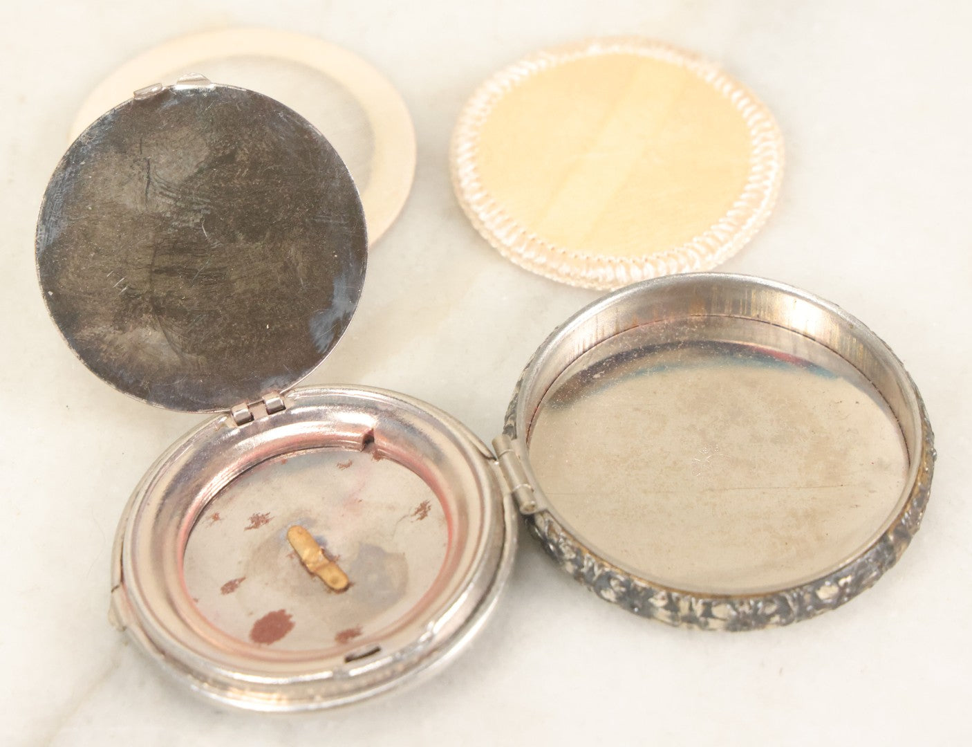 Lot 090 - Vintage Silverplate Compact With Floral Motif Edge And M.P. Monogram On Verso