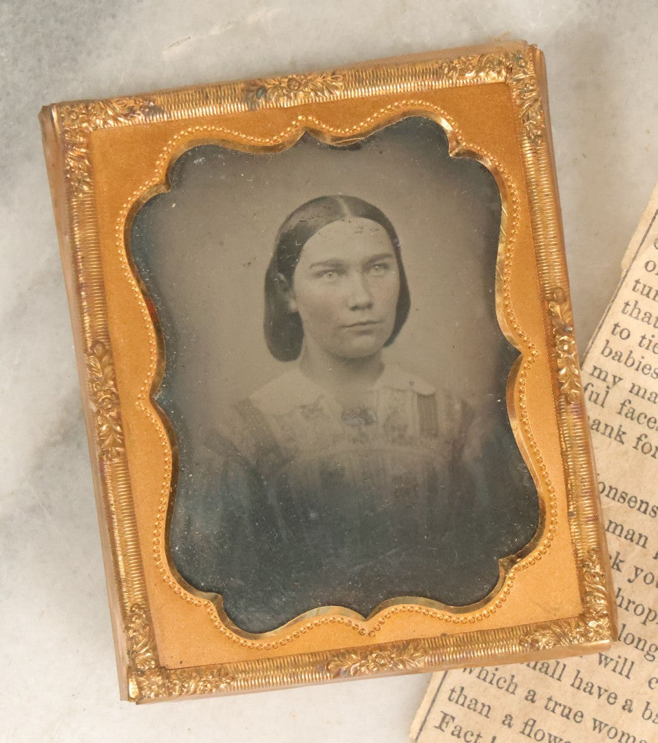 Lot 099 - Antique 1/9th Plate Ambrotype Photograph In Half Leatherette Union Case, Identified As Mary Caroline Patch With Advice Column Clipping From The Portland Transcript, Signed Ms. Polly Patch, As Found