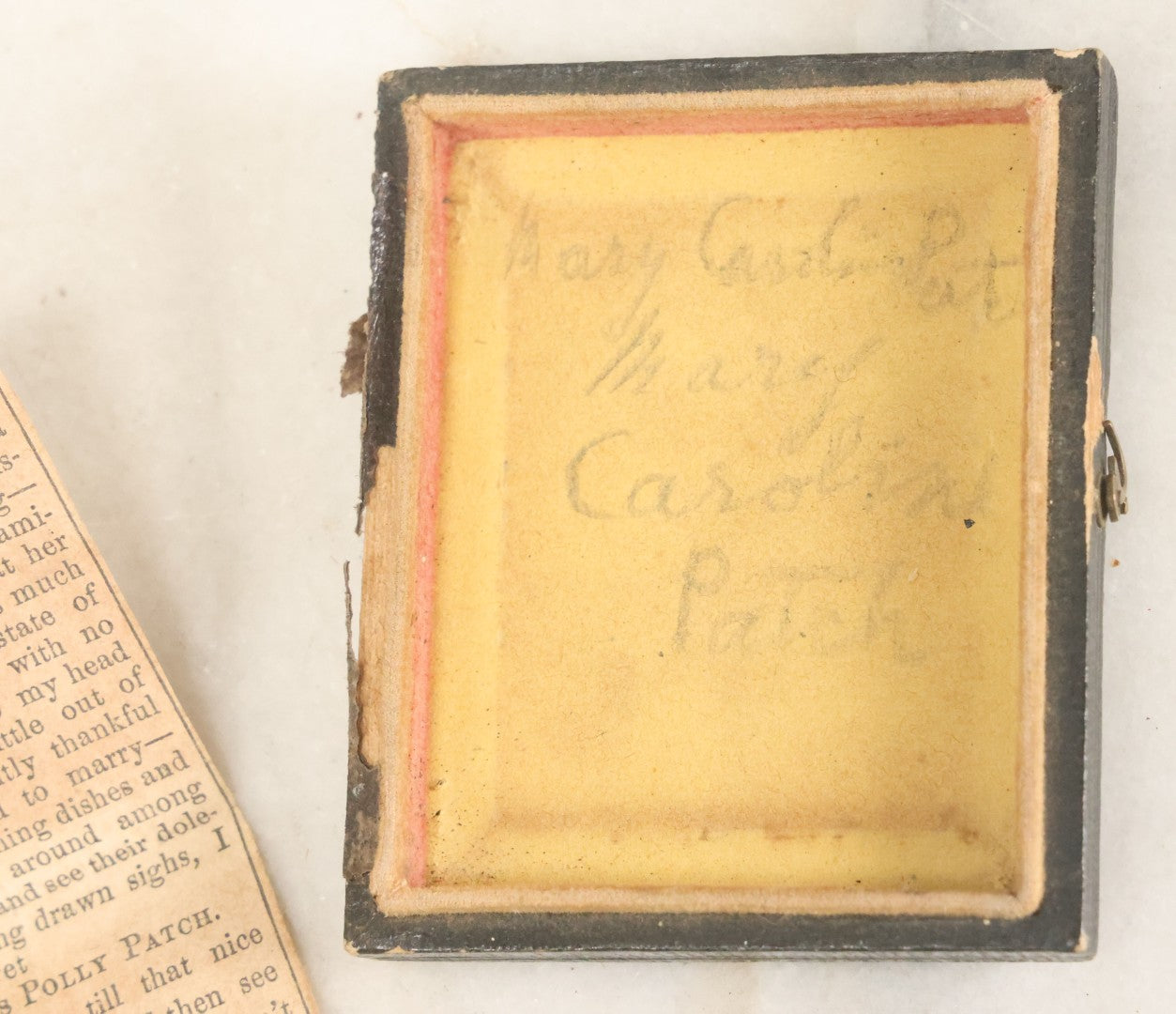 Lot 099 - Antique 1/9th Plate Ambrotype Photograph In Half Leatherette Union Case, Identified As Mary Caroline Patch With Advice Column Clipping From The Portland Transcript, Signed Ms. Polly Patch, As Found