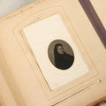 Lot 122 - Antique Cabinet Card And Tintype Family Photo Album, 10 C.D.V. Photos, 10 Tintypes, 4 Illustrated Album Filler Cards, Including Tintype Of Grandma Sherman In Mourning And C.D.V. Of Twin Girls