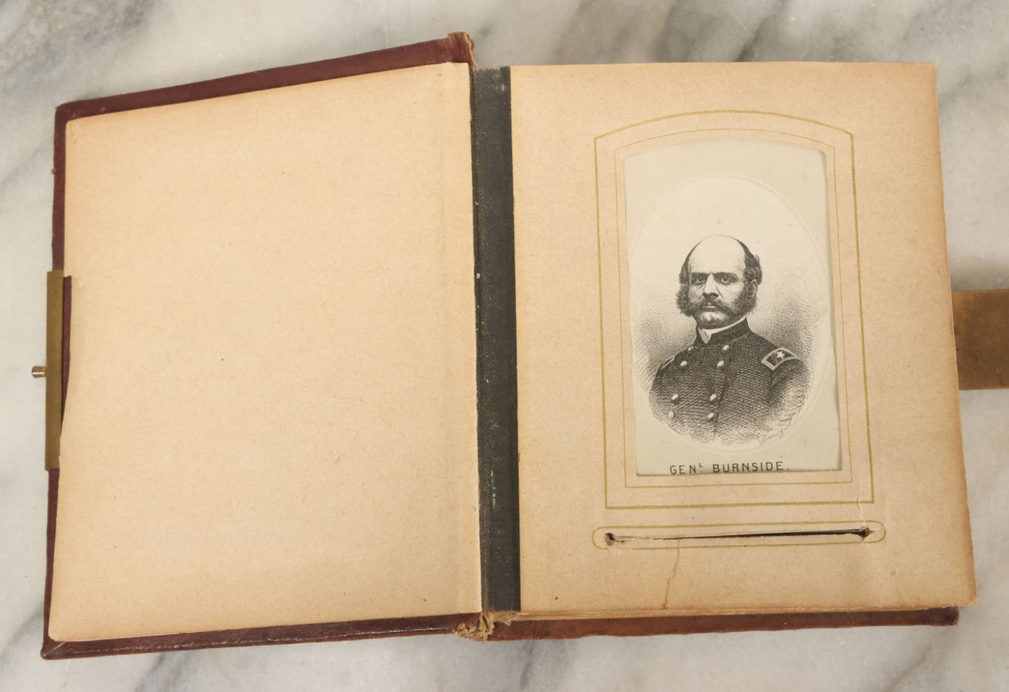 Lot 122 - Antique Cabinet Card And Tintype Family Photo Album, 10 C.D.V. Photos, 10 Tintypes, 4 Illustrated Album Filler Cards, Including Tintype Of Grandma Sherman In Mourning And C.D.V. Of Twin Girls