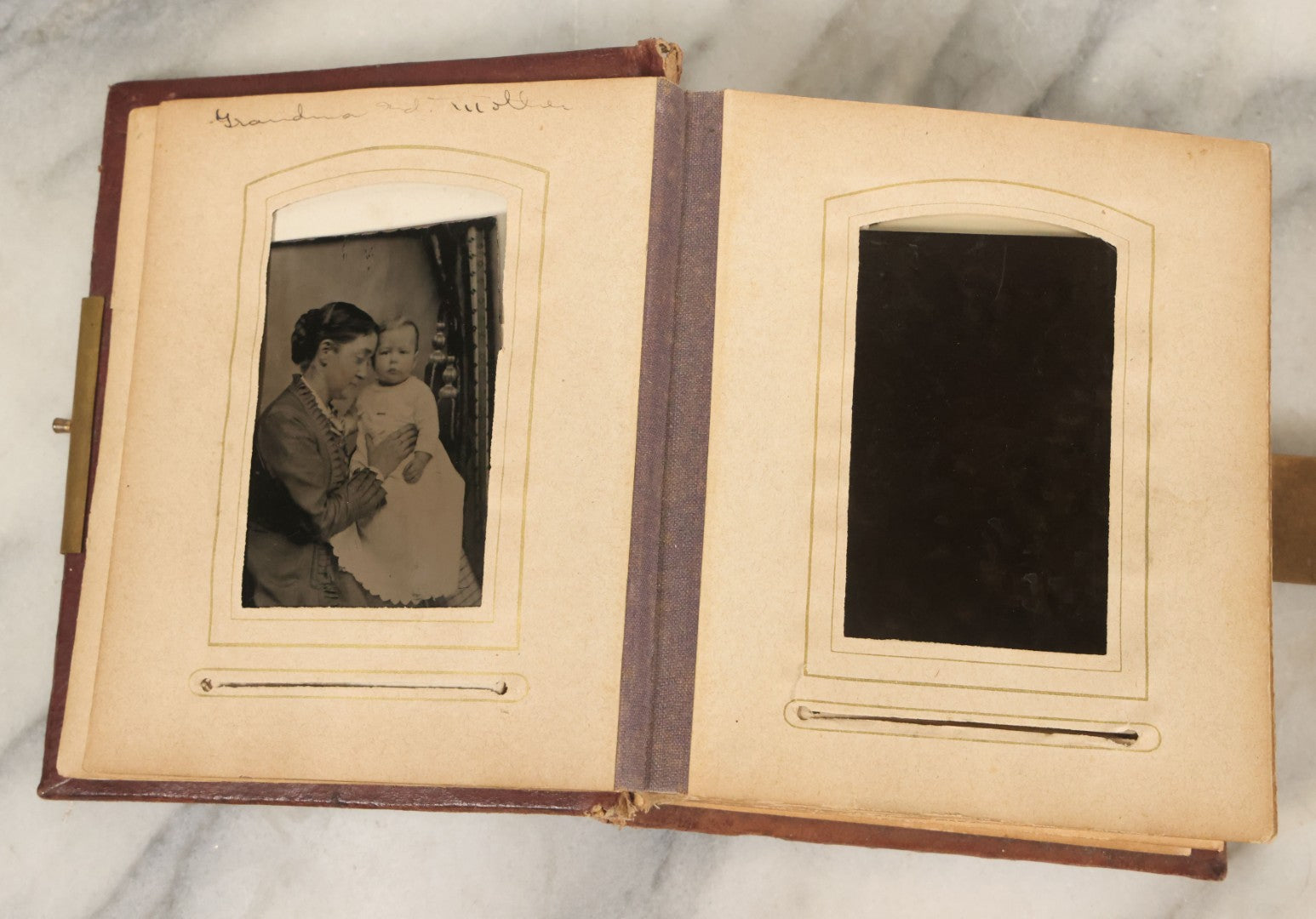 Lot 122 - Antique Cabinet Card And Tintype Family Photo Album, 10 C.D.V. Photos, 10 Tintypes, 4 Illustrated Album Filler Cards, Including Tintype Of Grandma Sherman In Mourning And C.D.V. Of Twin Girls