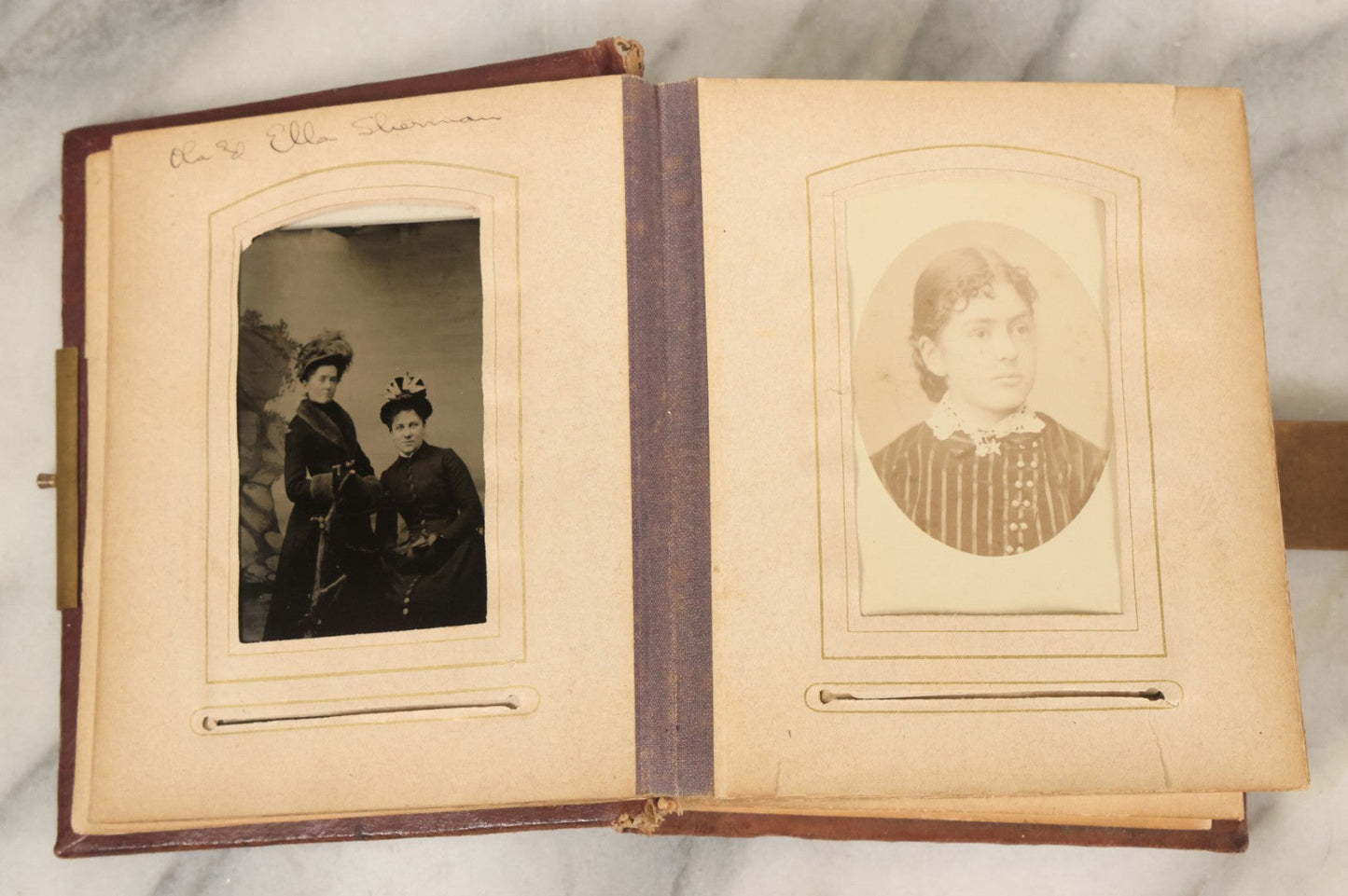 Lot 122 - Antique Cabinet Card And Tintype Family Photo Album, 10 C.D.V. Photos, 10 Tintypes, 4 Illustrated Album Filler Cards, Including Tintype Of Grandma Sherman In Mourning And C.D.V. Of Twin Girls