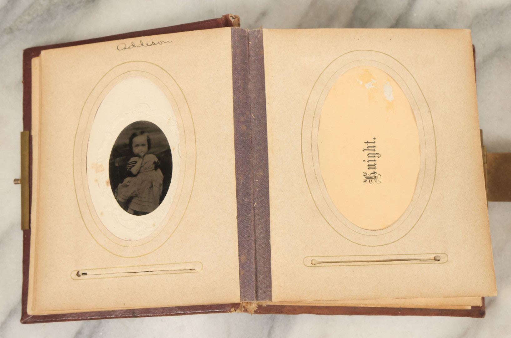 Lot 122 - Antique Cabinet Card And Tintype Family Photo Album, 10 C.D.V. Photos, 10 Tintypes, 4 Illustrated Album Filler Cards, Including Tintype Of Grandma Sherman In Mourning And C.D.V. Of Twin Girls