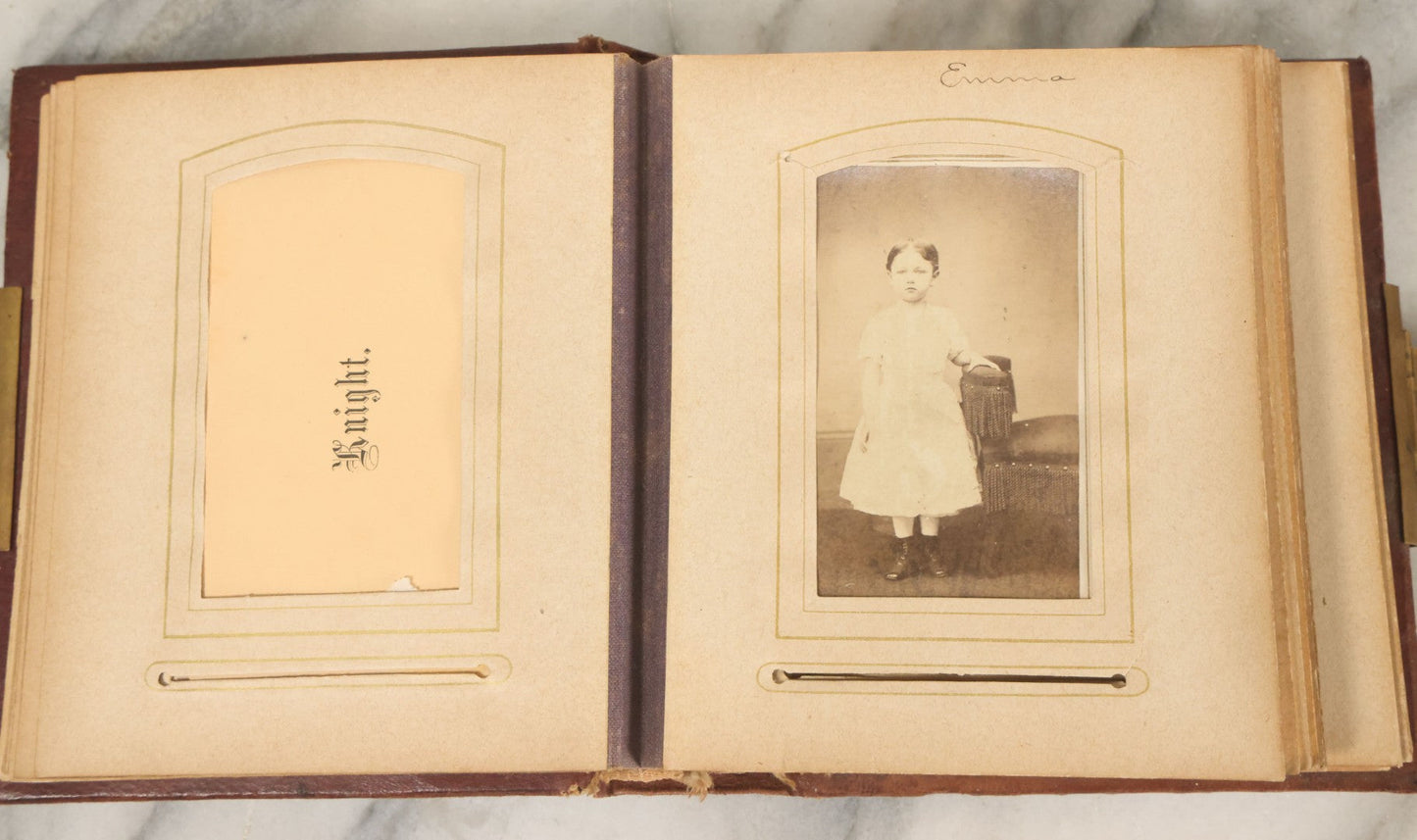 Lot 122 - Antique Cabinet Card And Tintype Family Photo Album, 10 C.D.V. Photos, 10 Tintypes, 4 Illustrated Album Filler Cards, Including Tintype Of Grandma Sherman In Mourning And C.D.V. Of Twin Girls