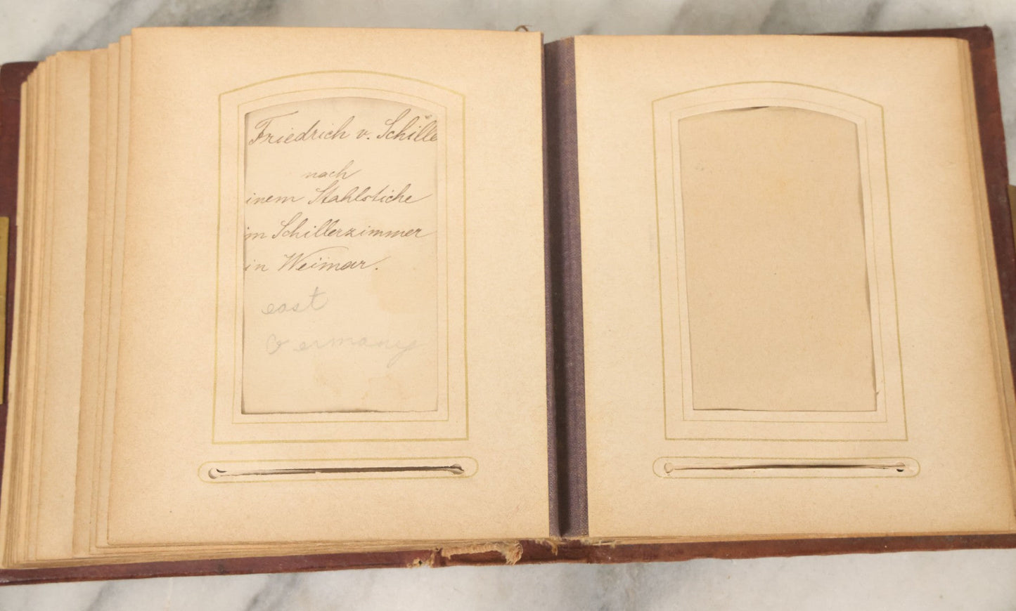 Lot 122 - Antique Cabinet Card And Tintype Family Photo Album, 10 C.D.V. Photos, 10 Tintypes, 4 Illustrated Album Filler Cards, Including Tintype Of Grandma Sherman In Mourning And C.D.V. Of Twin Girls