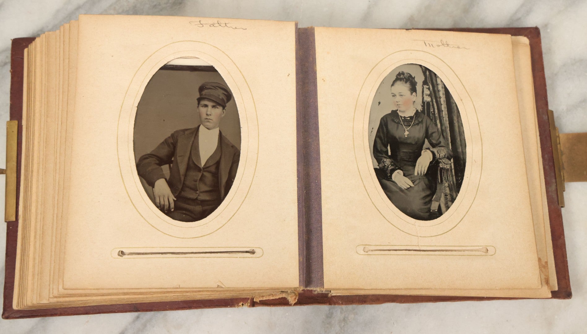 Lot 122 - Antique Cabinet Card And Tintype Family Photo Album, 10 C.D.V. Photos, 10 Tintypes, 4 Illustrated Album Filler Cards, Including Tintype Of Grandma Sherman In Mourning And C.D.V. Of Twin Girls
