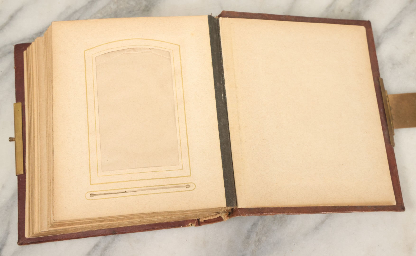 Lot 122 - Antique Cabinet Card And Tintype Family Photo Album, 10 C.D.V. Photos, 10 Tintypes, 4 Illustrated Album Filler Cards, Including Tintype Of Grandma Sherman In Mourning And C.D.V. Of Twin Girls