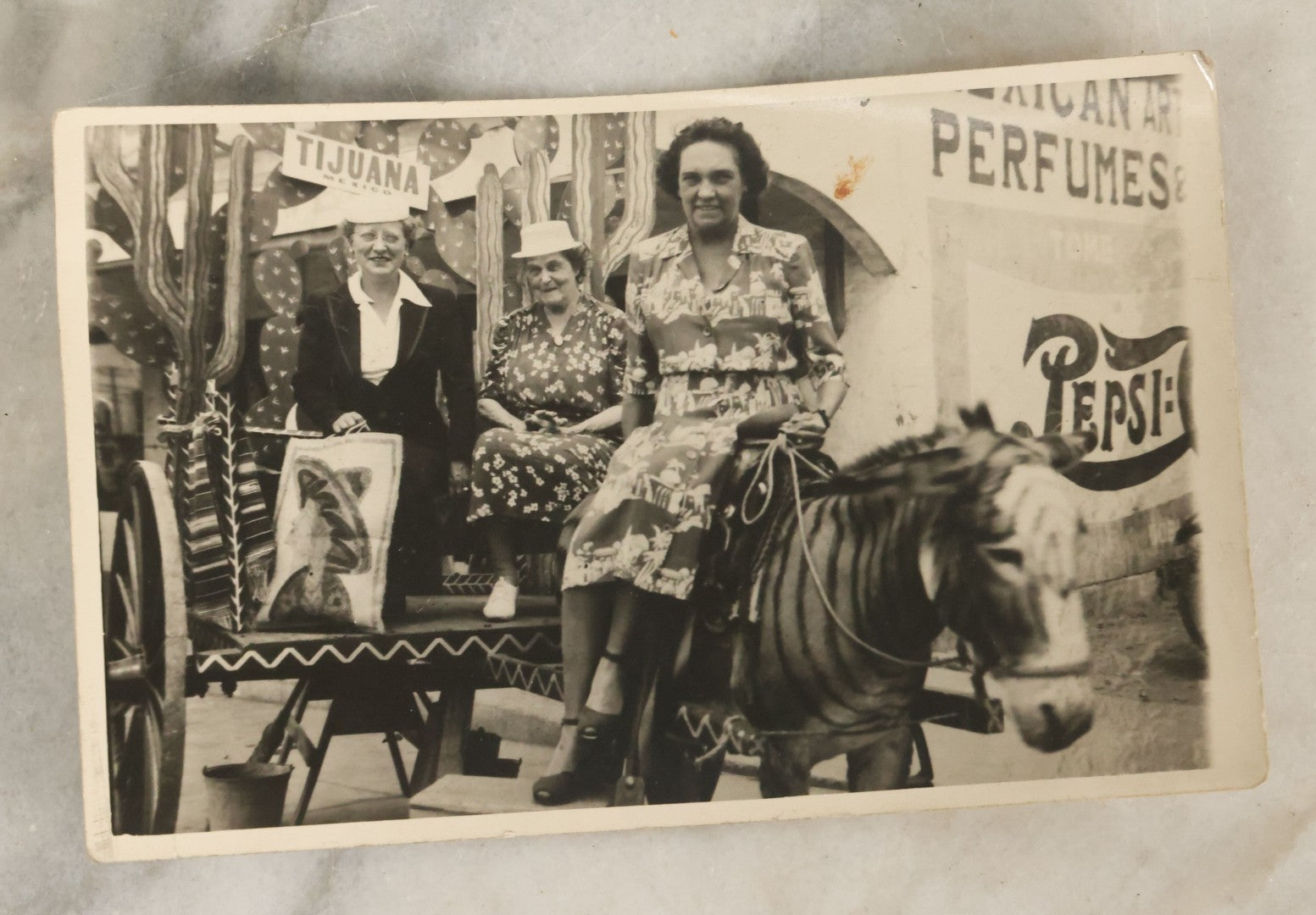 Lot 125 - Vintage Postcard-Sized Photograph Of Ladies On Carriage Pulled By Donkey Painted As Zebra, In Tijuana, Mexico, Pepsi Advertisement In Background