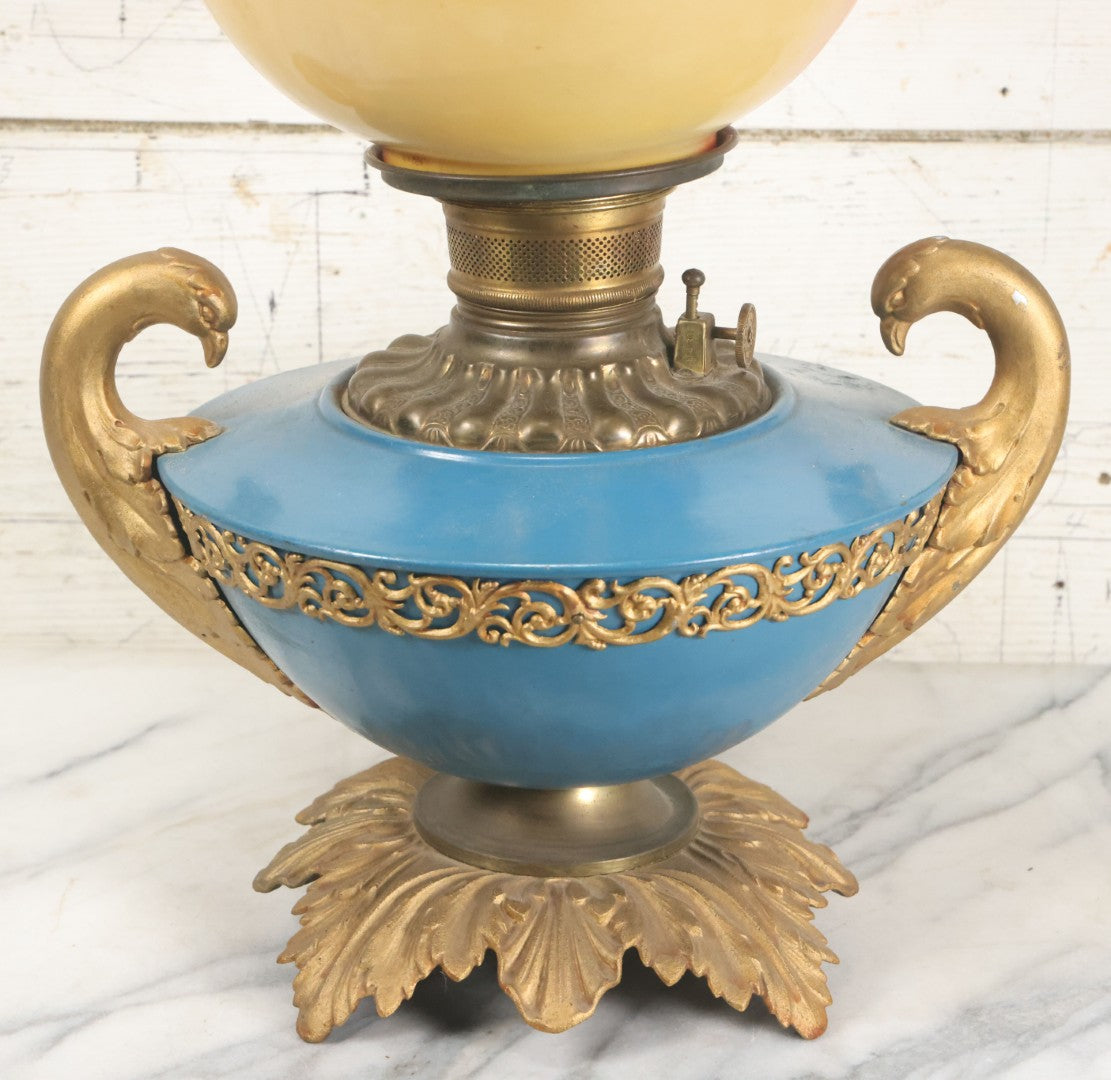 Lot 003 - Antique Kerosene Oil Lamp With Painted Blue Tin Font, Dove Head Motif, And Hand Painted Globe With Floral Motif By Pittsburgh Lamp And Brass, Made In America, Note Cracked And Repaired Section Of Globe, 19" High