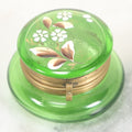 Lot 107 - Vintage Green Glass Pill Box With Hand Painted Flower Details And Brass Latch (Does Not Glow Under Blacklight), 2" Diameter