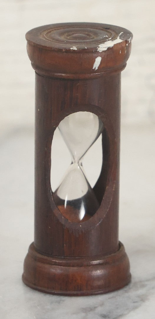 Lot 110 - Vintage Red Sand Hourglass In Turned Wooden Holder With Threaded Tops, Note Chips In Wood, Paint Marks, 2-5/8" Height