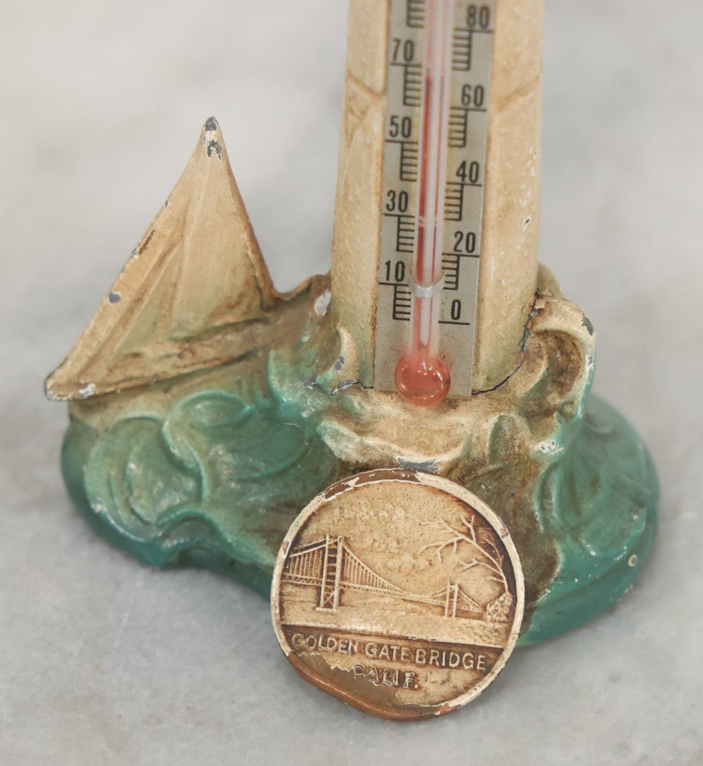Lot 111 - Vintage Cold Painted Cast Pot Metal Souvenir Lighthouse And Sailboat Thermometer From Golden Gate Bridge, San Francisco California
