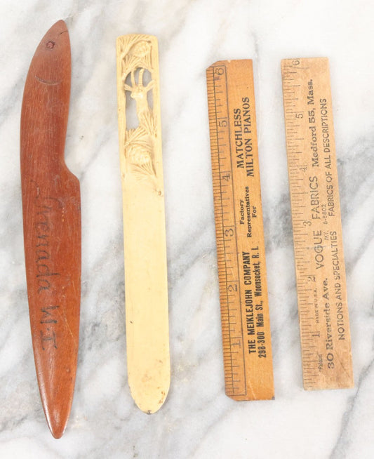 Lot 121 - Grouping Of Vintage Desk Tools Including Two Advertising Rulers, Carved Fish Letter Opener, And Celluloid Pronghorn Page Turner