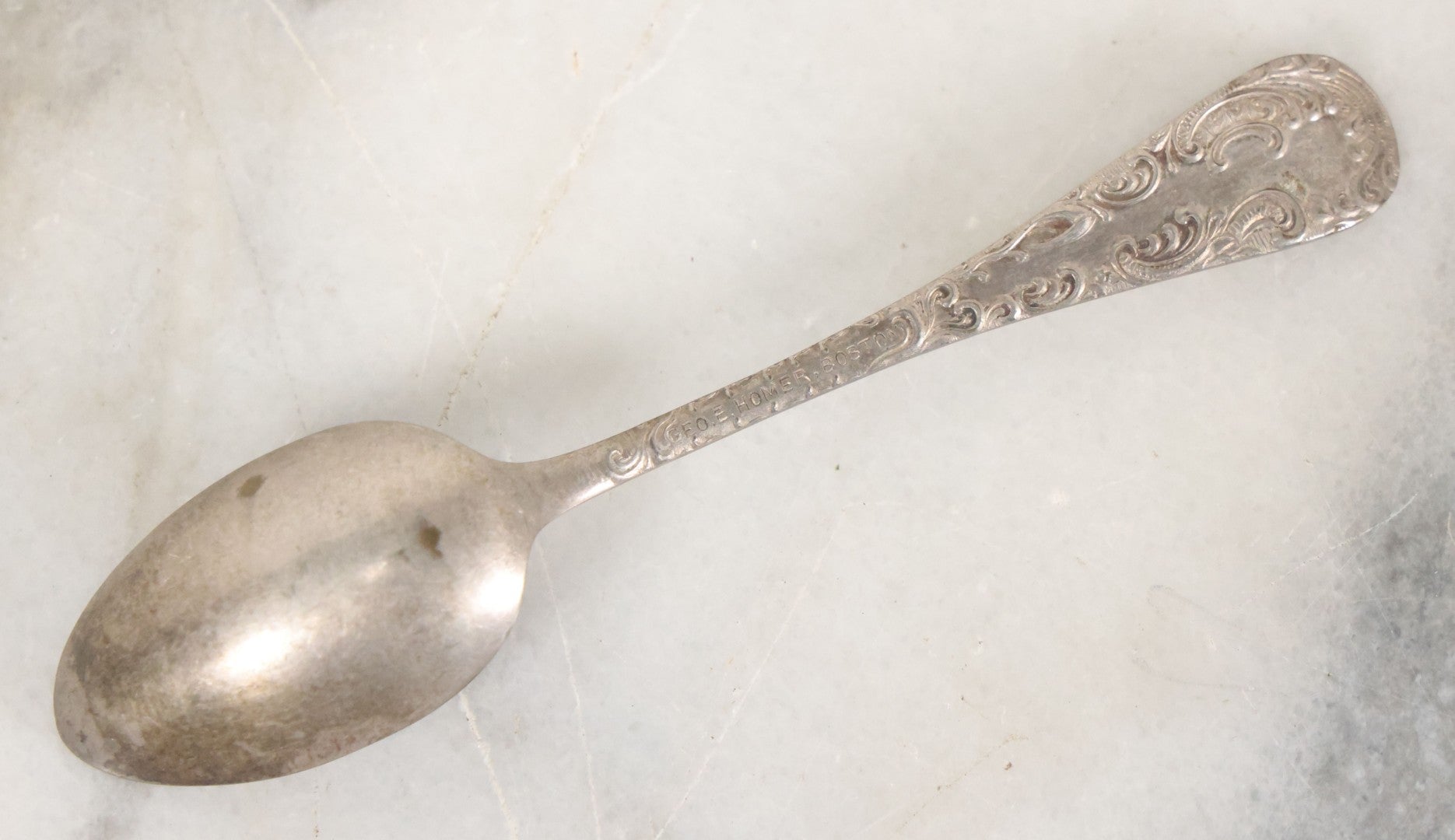 Lot 122 - Grouping Of 8 Antique Souvenir Spoons Relating To Ships And Leaders Of The Spanish American War Including The U.S. Battleship Maine, The Flagship New York, And Others, Manufactured By George E. Homer, Boston