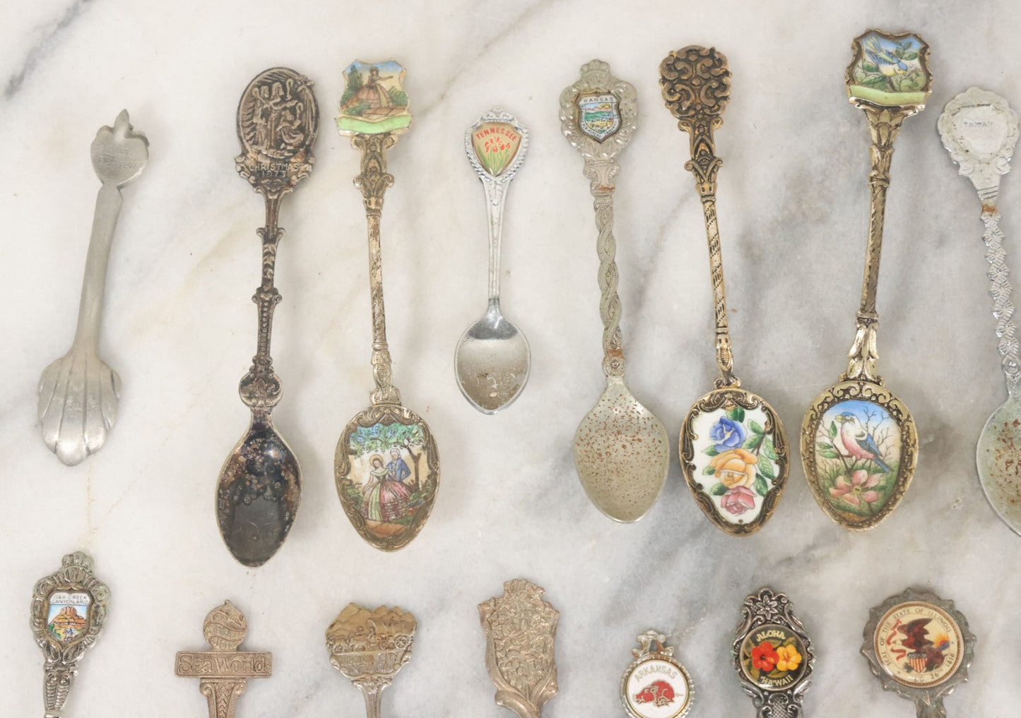 Lot 123 - Grouping Of 37 Souvenir Spoons Mostly From Travel, Landmarks, Etc., Including Sea World, Hawaii, And Many Other States