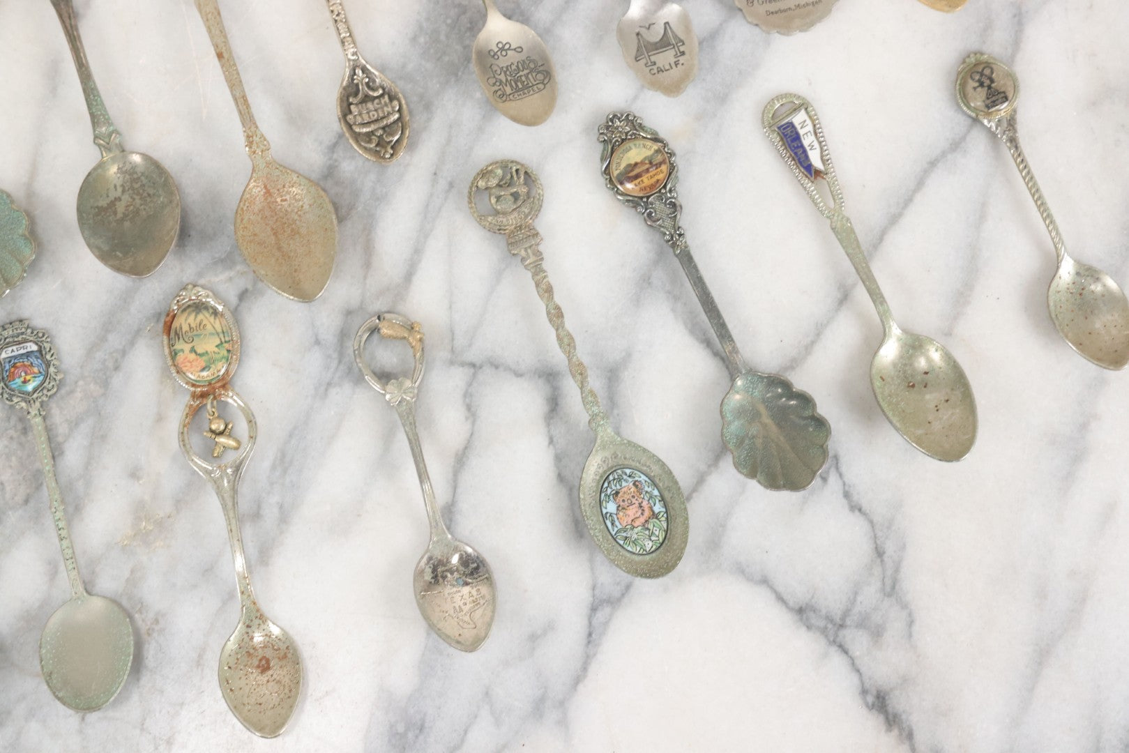 Lot 123 - Grouping Of 37 Souvenir Spoons Mostly From Travel, Landmarks, Etc., Including Sea World, Hawaii, And Many Other States
