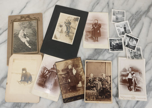 Lot 126 - Grouping Of 10+ Antique And Vintage Cabinet Card, Boarded, And Snapshot Photographs Of Children Posing And At Play, Including Girl With Dog, Children On Horse, Boy On Bicycle, And Boy On Sled