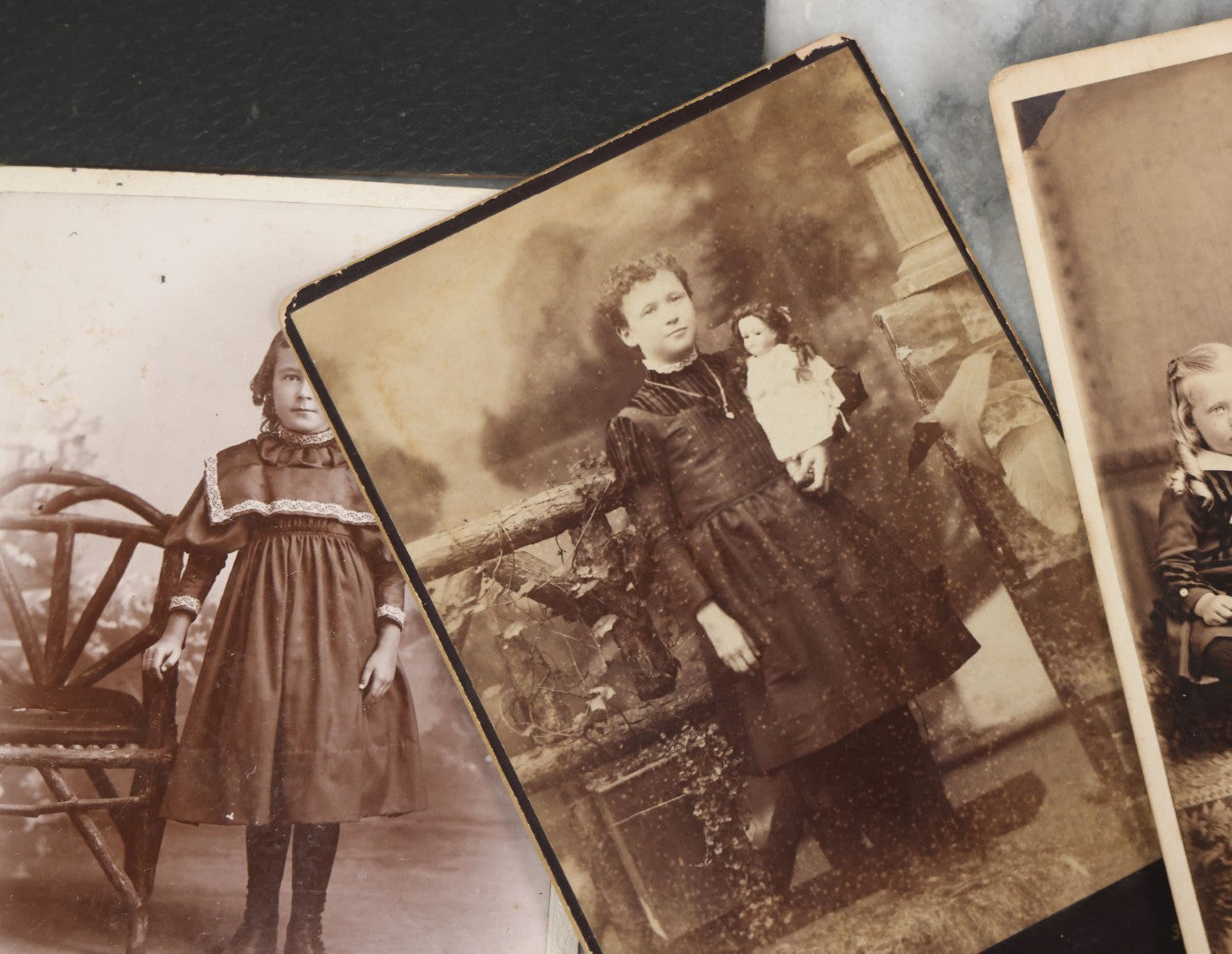 Lot 126 - Grouping Of 10+ Antique And Vintage Cabinet Card, Boarded, And Snapshot Photographs Of Children Posing And At Play, Including Girl With Dog, Children On Horse, Boy On Bicycle, And Boy On Sled