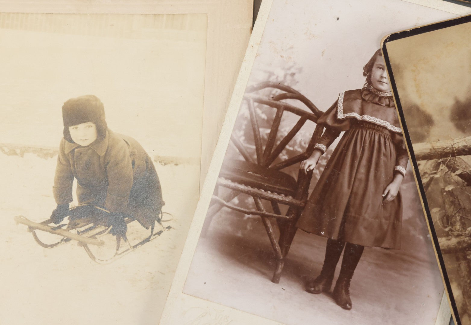 Lot 126 - Grouping Of 10+ Antique And Vintage Cabinet Card, Boarded, And Snapshot Photographs Of Children Posing And At Play, Including Girl With Dog, Children On Horse, Boy On Bicycle, And Boy On Sled