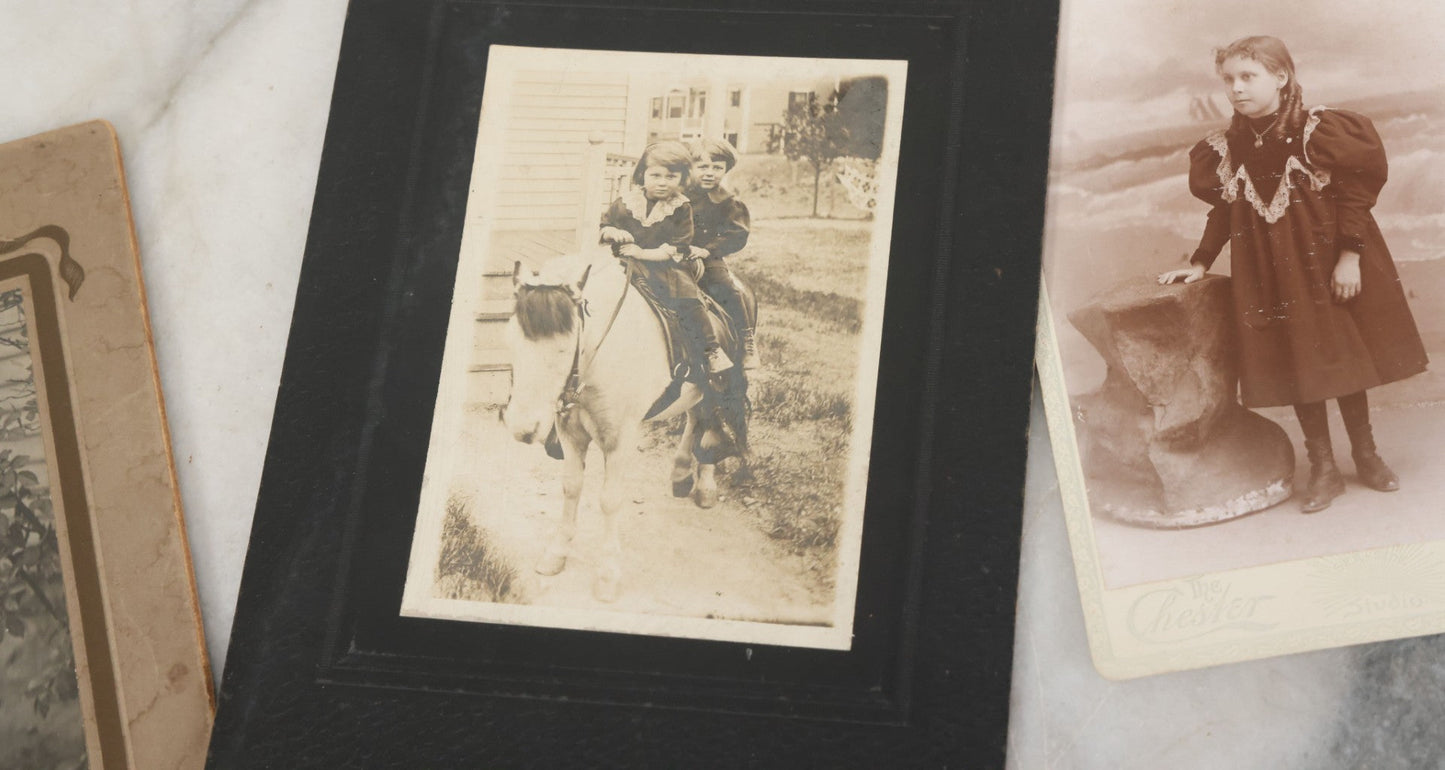 Lot 126 - Grouping Of 10+ Antique And Vintage Cabinet Card, Boarded, And Snapshot Photographs Of Children Posing And At Play, Including Girl With Dog, Children On Horse, Boy On Bicycle, And Boy On Sled
