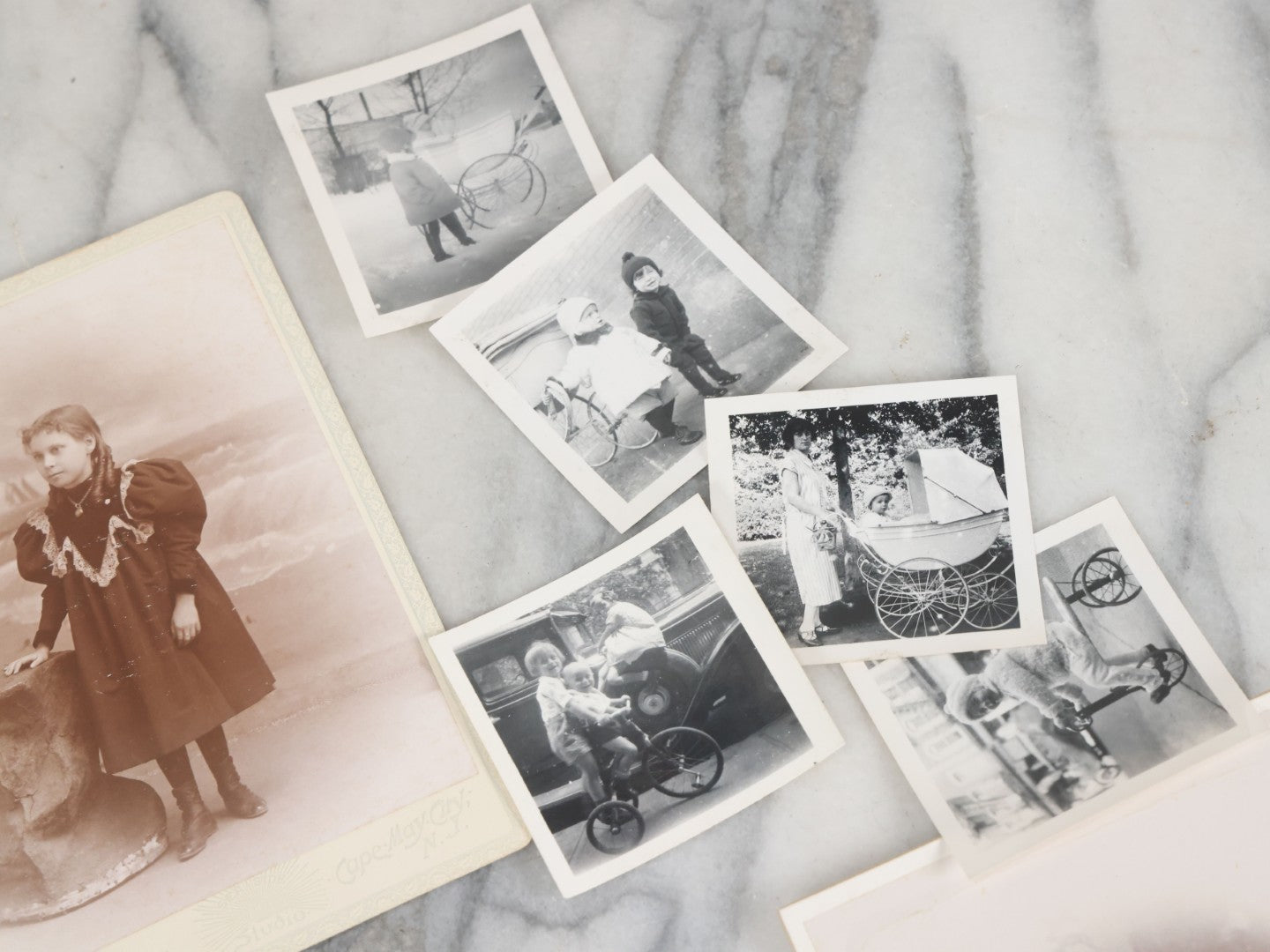 Lot 126 - Grouping Of 10+ Antique And Vintage Cabinet Card, Boarded, And Snapshot Photographs Of Children Posing And At Play, Including Girl With Dog, Children On Horse, Boy On Bicycle, And Boy On Sled