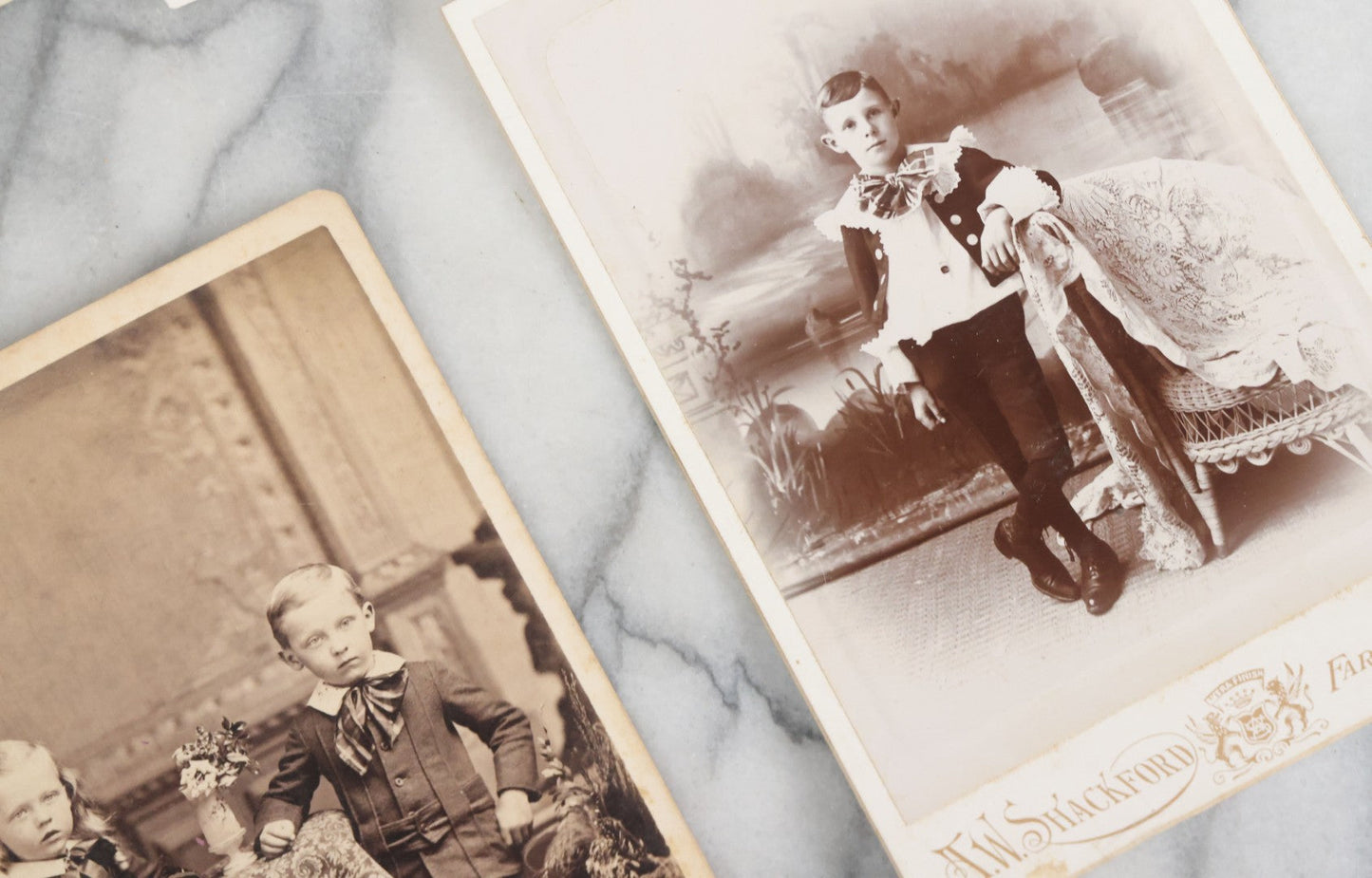 Lot 126 - Grouping Of 10+ Antique And Vintage Cabinet Card, Boarded, And Snapshot Photographs Of Children Posing And At Play, Including Girl With Dog, Children On Horse, Boy On Bicycle, And Boy On Sled
