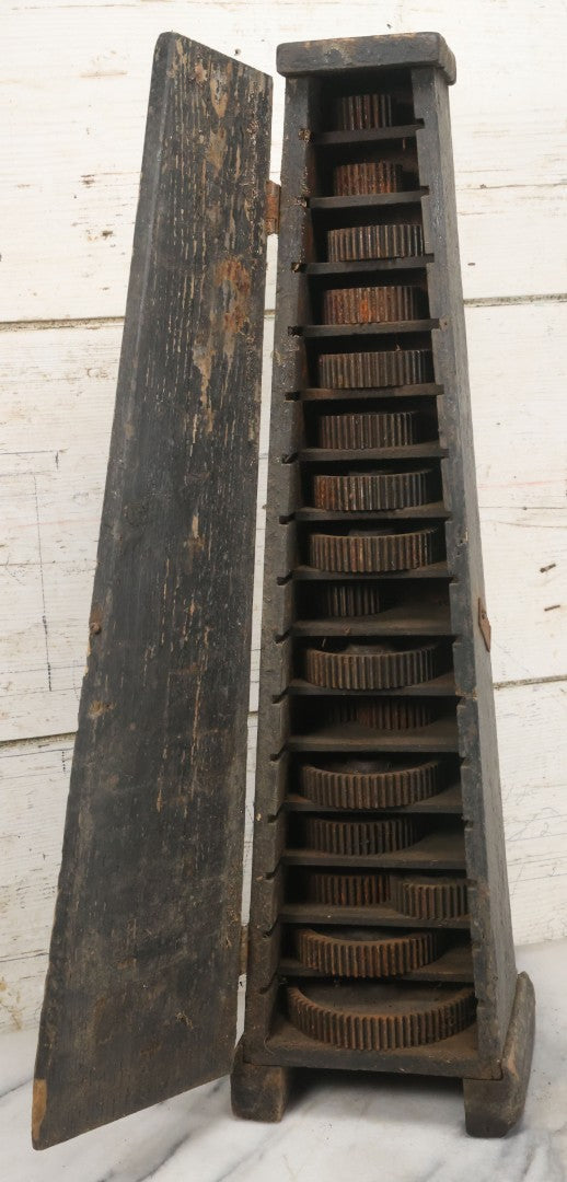 Lot 006 - Antique Industrial Salvage Decor Graduated Cast Iron Gear Tapered Wooden Storage Box, With Dividing Shelves And Contents, With Hinged Door, As Found, Dimensions In Description