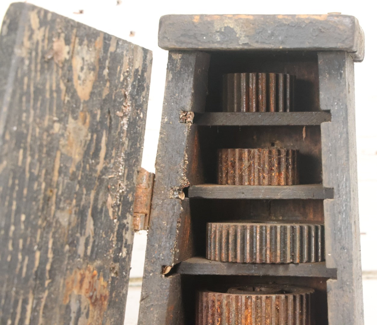 Lot 006 - Antique Industrial Salvage Decor Graduated Cast Iron Gear Tapered Wooden Storage Box, With Dividing Shelves And Contents, With Hinged Door, As Found, Dimensions In Description