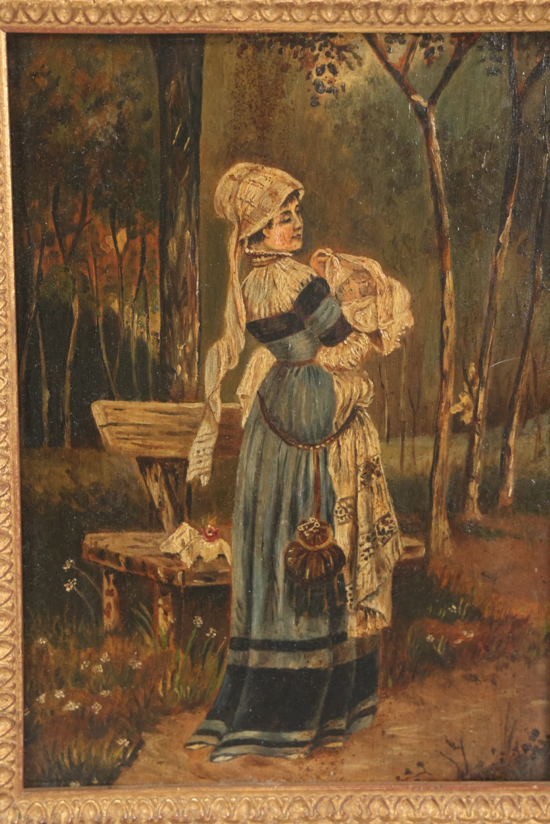 Lot 008 - Antique Painting On Wood Panel Of Victorian Woman In Blue Dress Holding Swaddled Baby By Park Bench, Unsigned, In Modern Frame, 9-1/2" x 11-7/8"