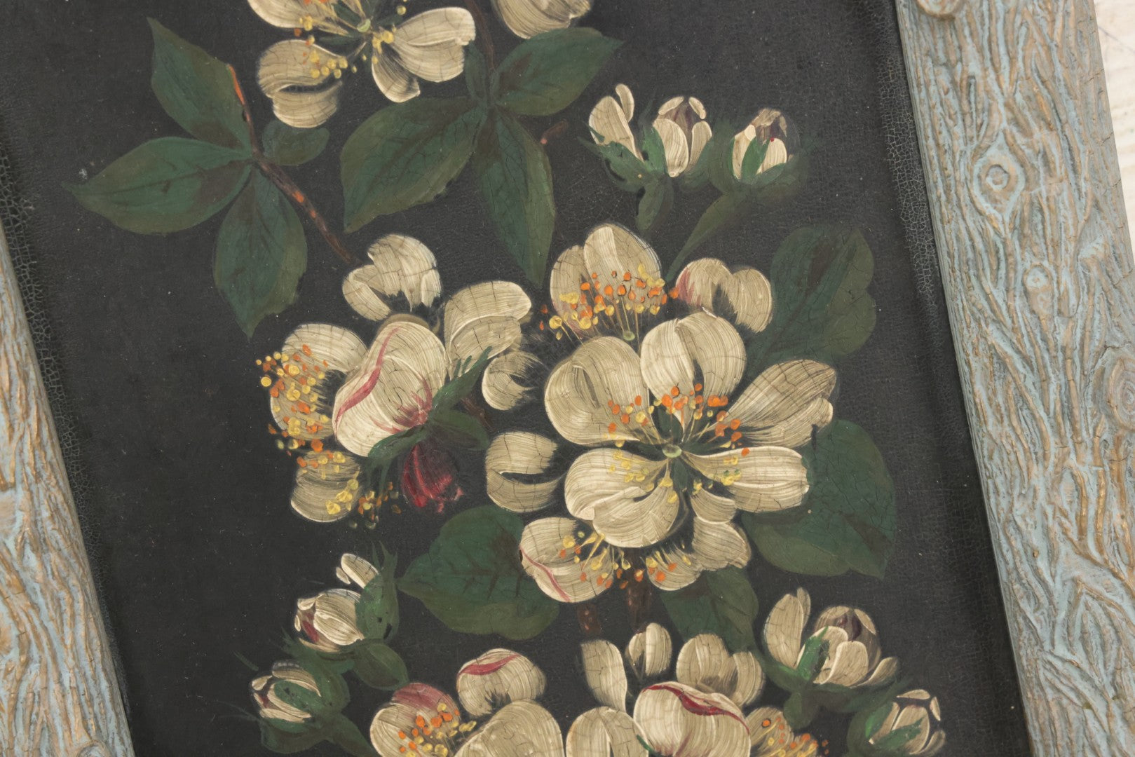 Lot 009 - Antique Painting On Tin Of White Flowers With Yellow And Orange Buds And Green Leaves In Original Faux-Branch Frame, 9-5/8" x 22-1/2"
