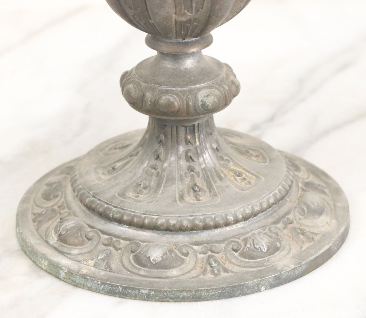 Lot 010 - Antique Ornate Cast Pot Metal Urn With Cherub And Goat Head Motifs, With Makers Mark On Bottom, Marked No. 1409, 9-1/2" High
