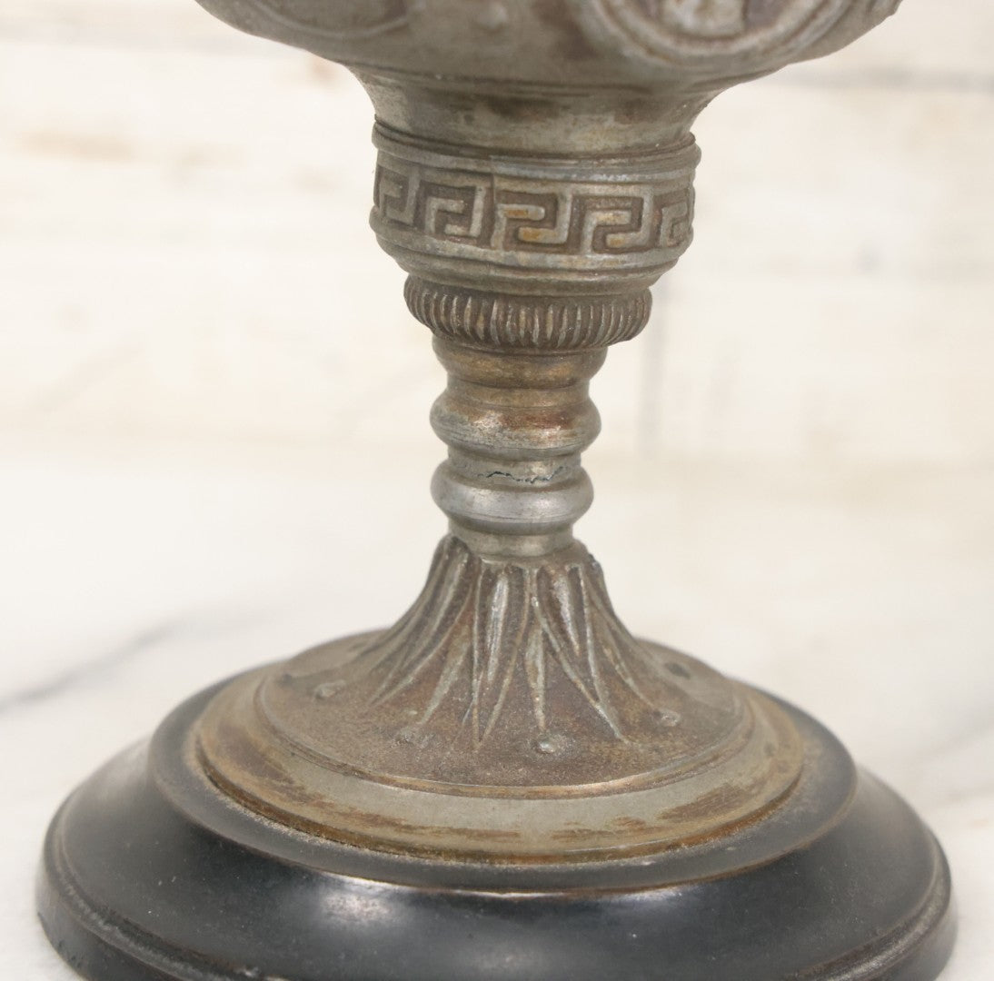 Lot 011 - Pair Of Antique Ornate Cast Pot Metal Ewers, With Woman's Head On Handle, And Woman's Head In Profile, Greek Key Design, Note Crack In Handle And Crack On Base Of One, 10-5/8" High Each