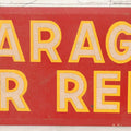 Lot 025 - Vintage Red Garage For Rent Tin Tacker Sign With Smaltz Lettering, White Letters With Yellow Outlines, 9-1/4" x 3-1/2"